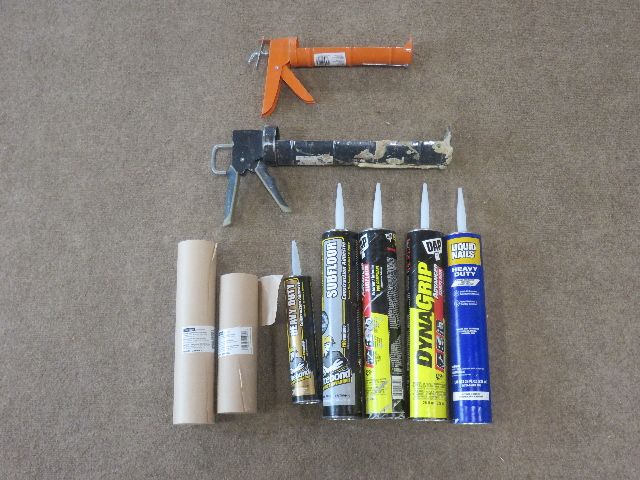 LOT OF CAULKING GUNS AND VARIOUS CAULKING AND GLUE TUBES