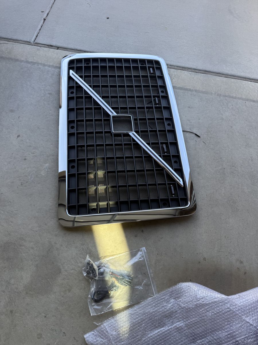 Replacement Chrome Grill Grille for 2004-2017 Volvo VNL Semi Trucks with Bug Screen and Stripe