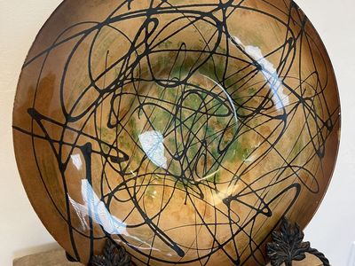 Beautiful large ceramic plate decor with heavy duty easel. Perfect for fireplace, sofa table or any location indoors.