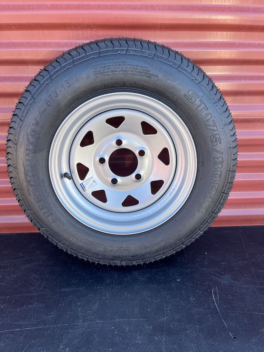 New ST 175/80 D 13 Trailer Tire On Silver Wheel