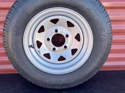 New ST 175/80 D 13 Trailer Tire On Silver Wheel