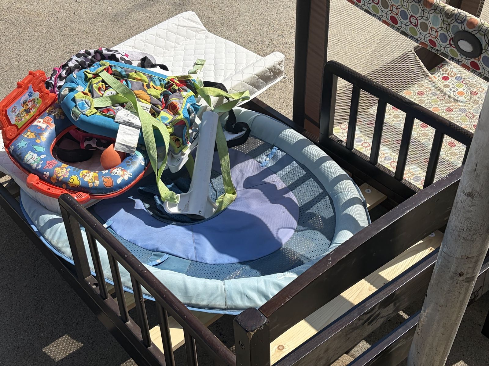Assorted Baby Equipment Lot - Wooden Toddler Bed Frame, Pack and Play, Changing Pad & Accessories