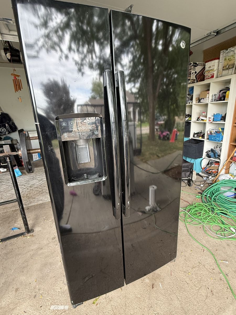 Black GE Side-by-Side Refrigerator with Water Dispenser