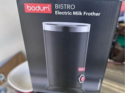 Starbucks barista and milk frother