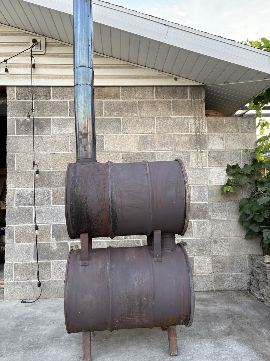 Working Double-Barrel Wood-Burning Stove with Chimney