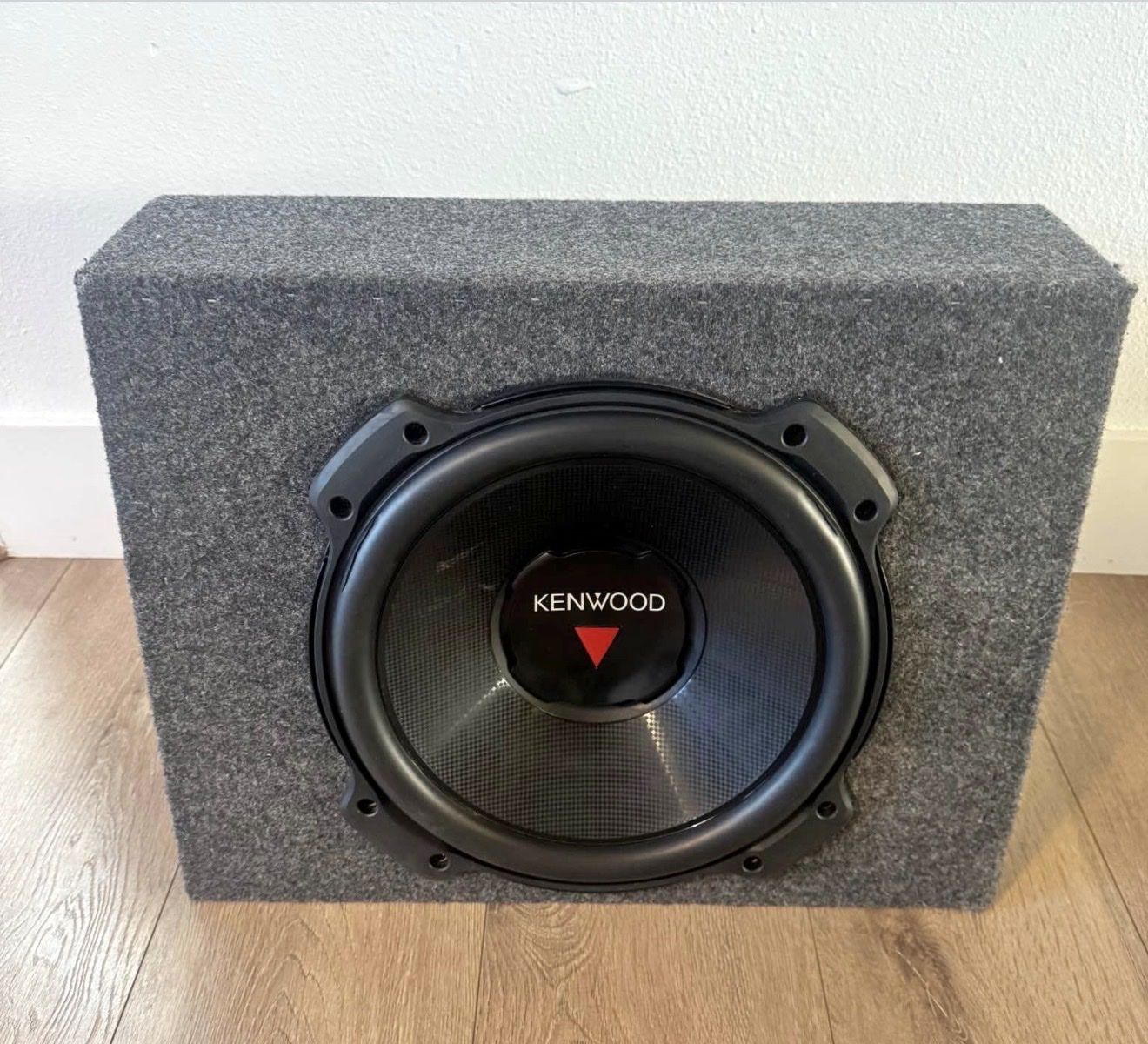 12” Kenwood subwoofer with 5”X7.75”X15” box.