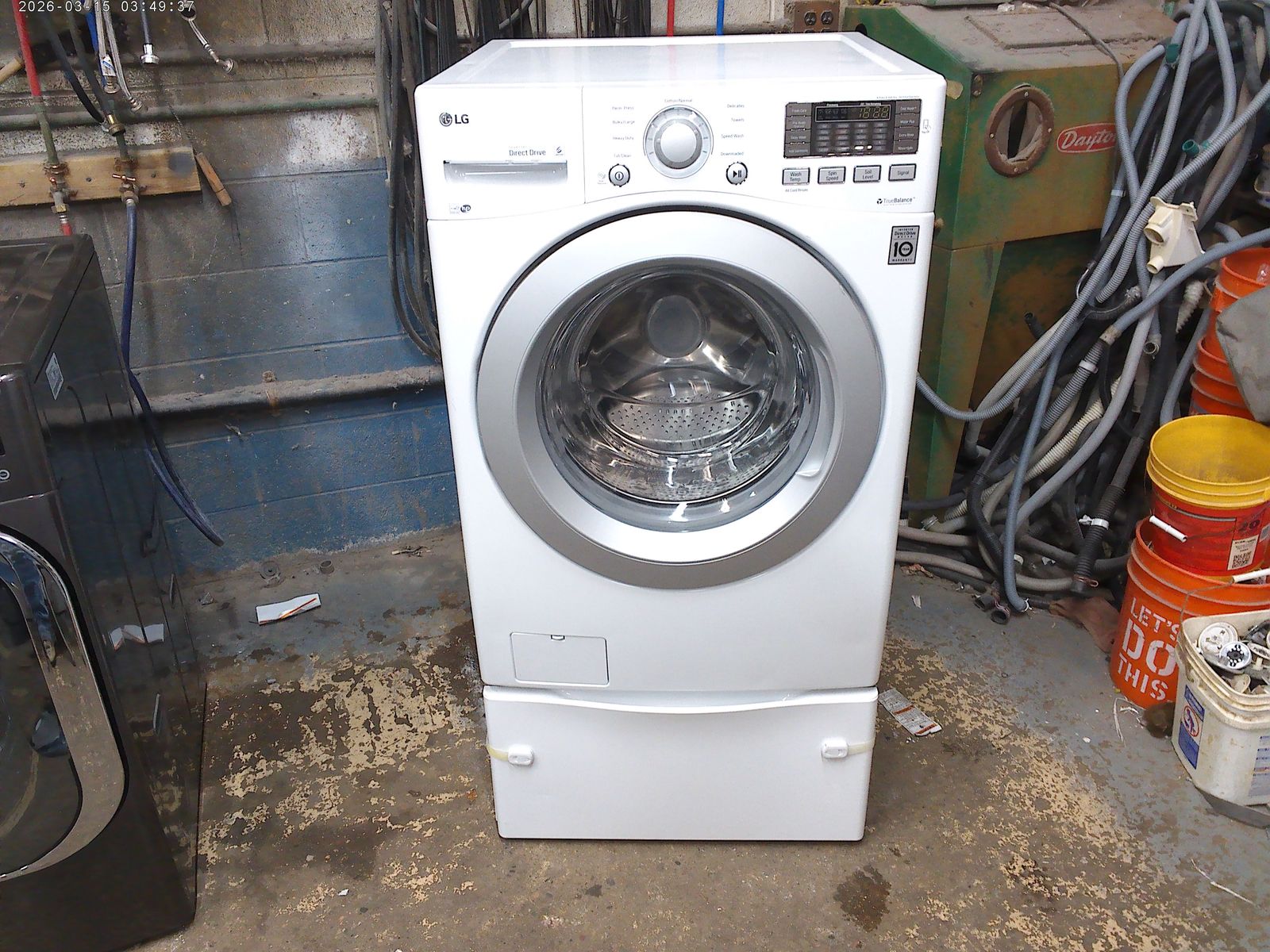 LG front load washer on pedestal