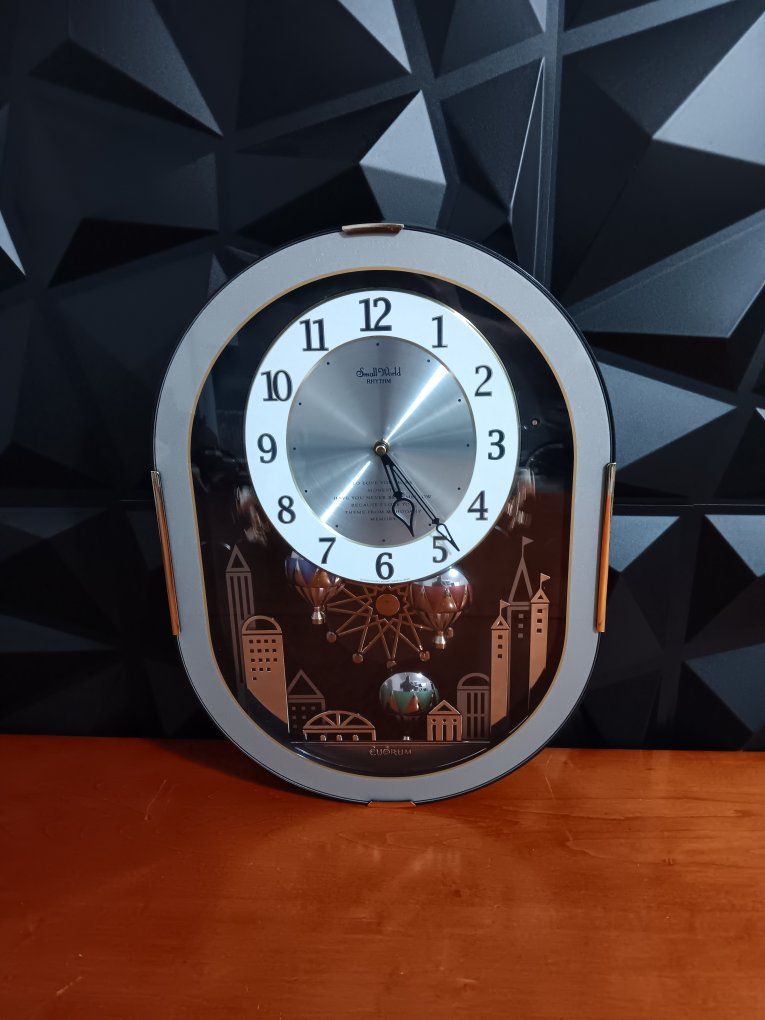 Rhythm "Magic Balloons" Magic Motion Musical Wall Clock with Animated Figurines - 4MH758-R08