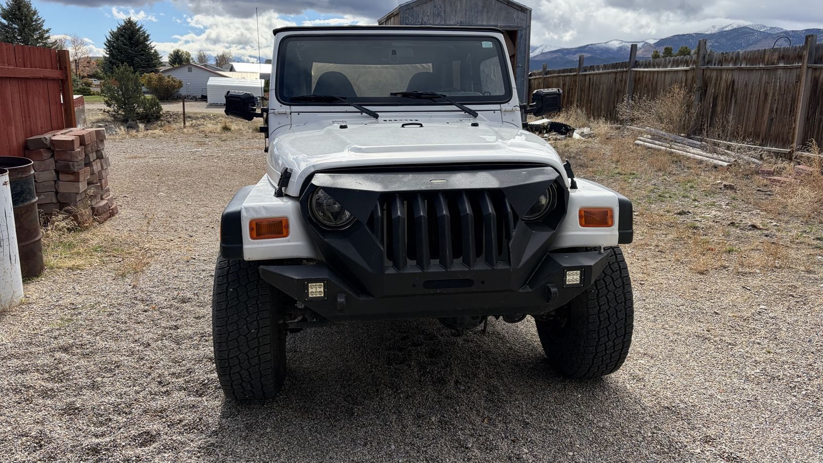 White Jeep Wrangler 4.0L with Soft Top and Custom Black Grill ...