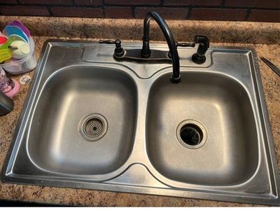 Dual stainless steel kitchen sink with faucet