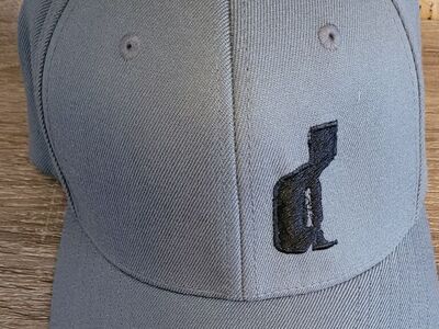 Dark gray baseball cap with an embroidered image