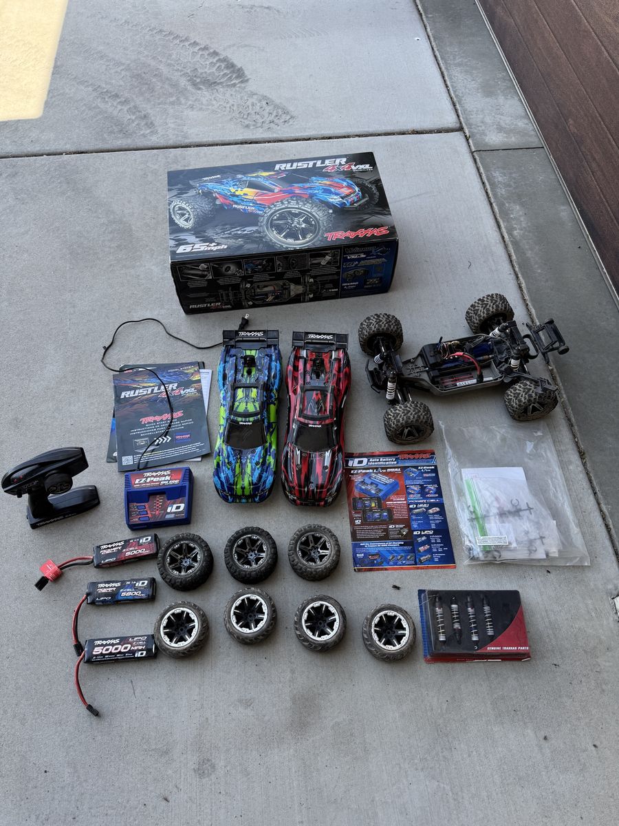 Traxxas Rustler 4X4 VXL RC Truck Bundle w/ Extra Parts, Batteries, and Charger - Used