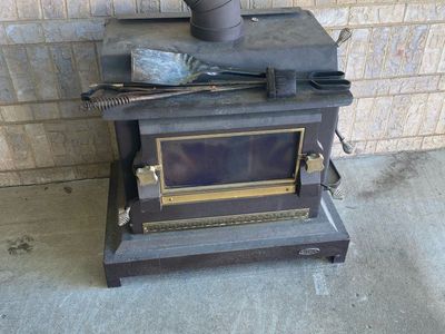 Wood Burning Stove with Flue Pipe and Fireplace Tools