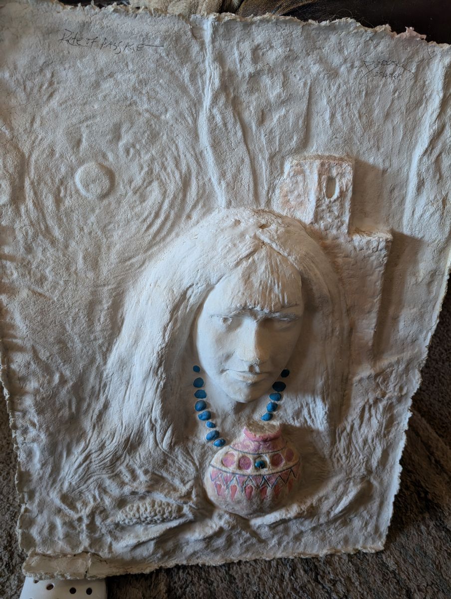Handmade cast paper sculpture titled 'Rite of Passage. 