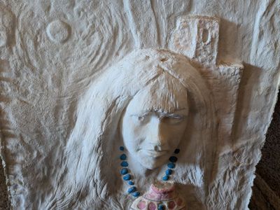 Handmade cast paper sculpture titled 'Rite of Passage.