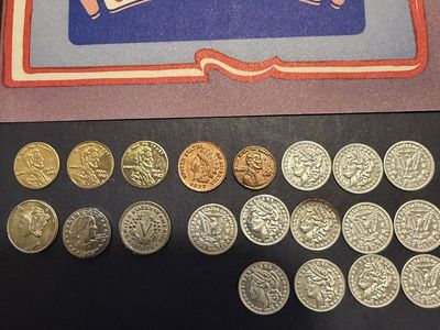 Miniature sterling silver Carson City replica coins