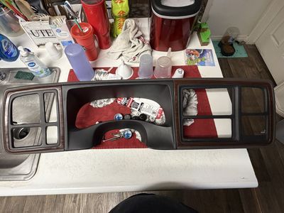 03-06 gmt 800 wood grain caddy dash bezel