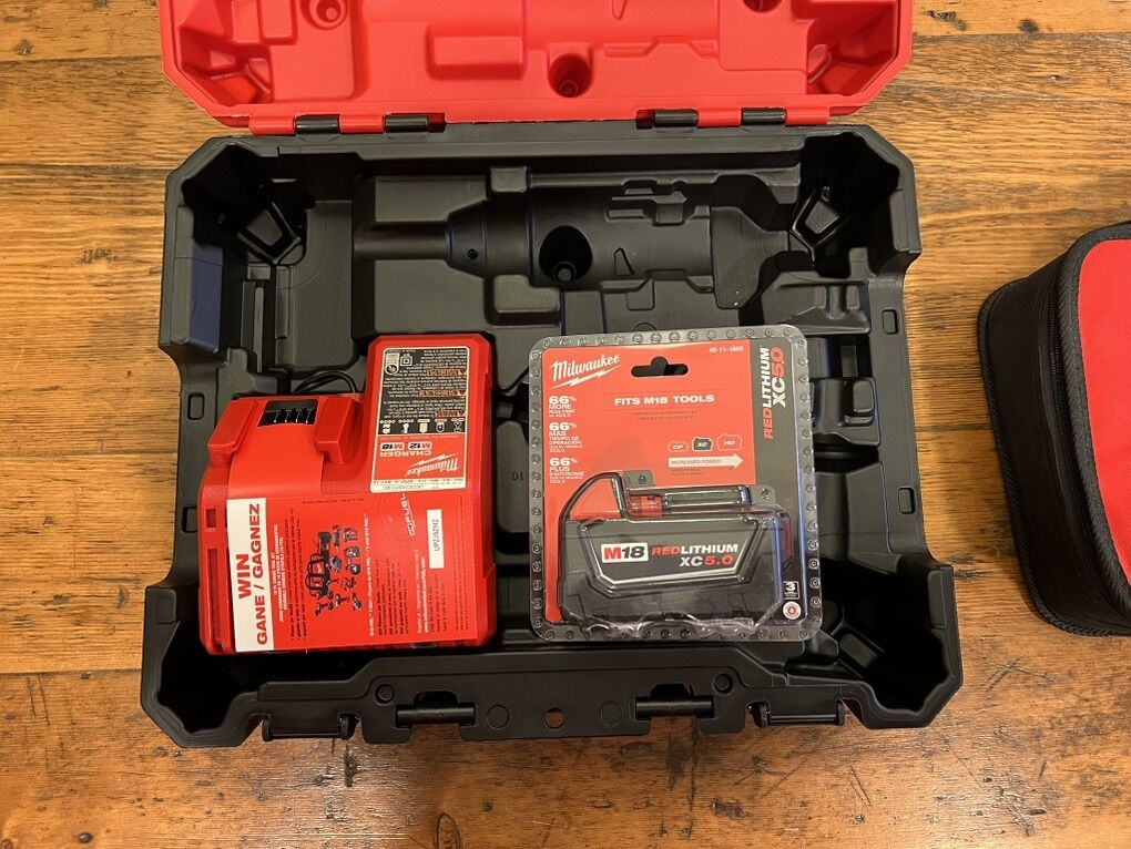 Brand New Milwaukee M18 Charger and XC 5.0 Battery