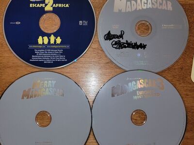 (4) DVDs Madagascar 1, 2, 3, and Merry - no cases