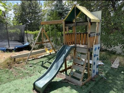 Free playground, trampoline, flowers, swing set