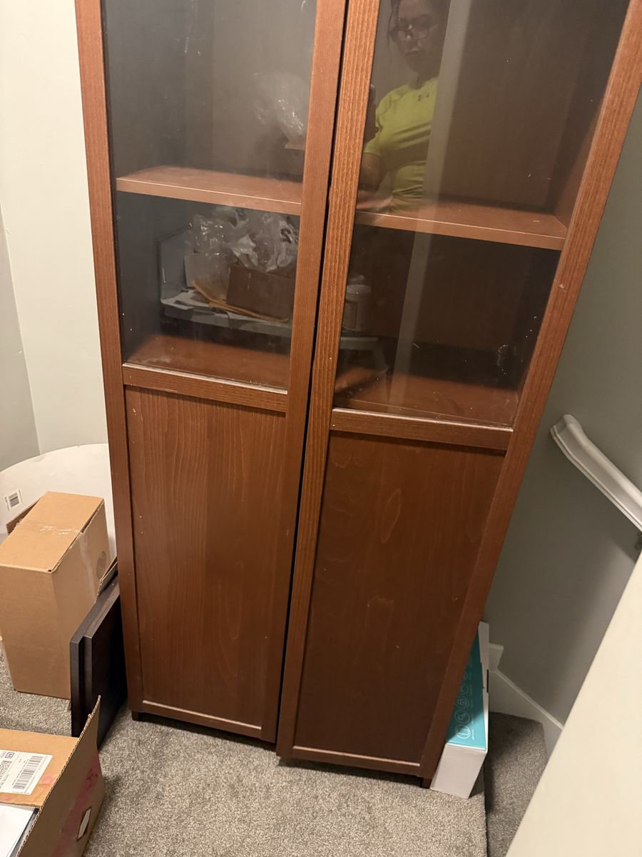 Dark brown wooden display cabinet with glass door-used