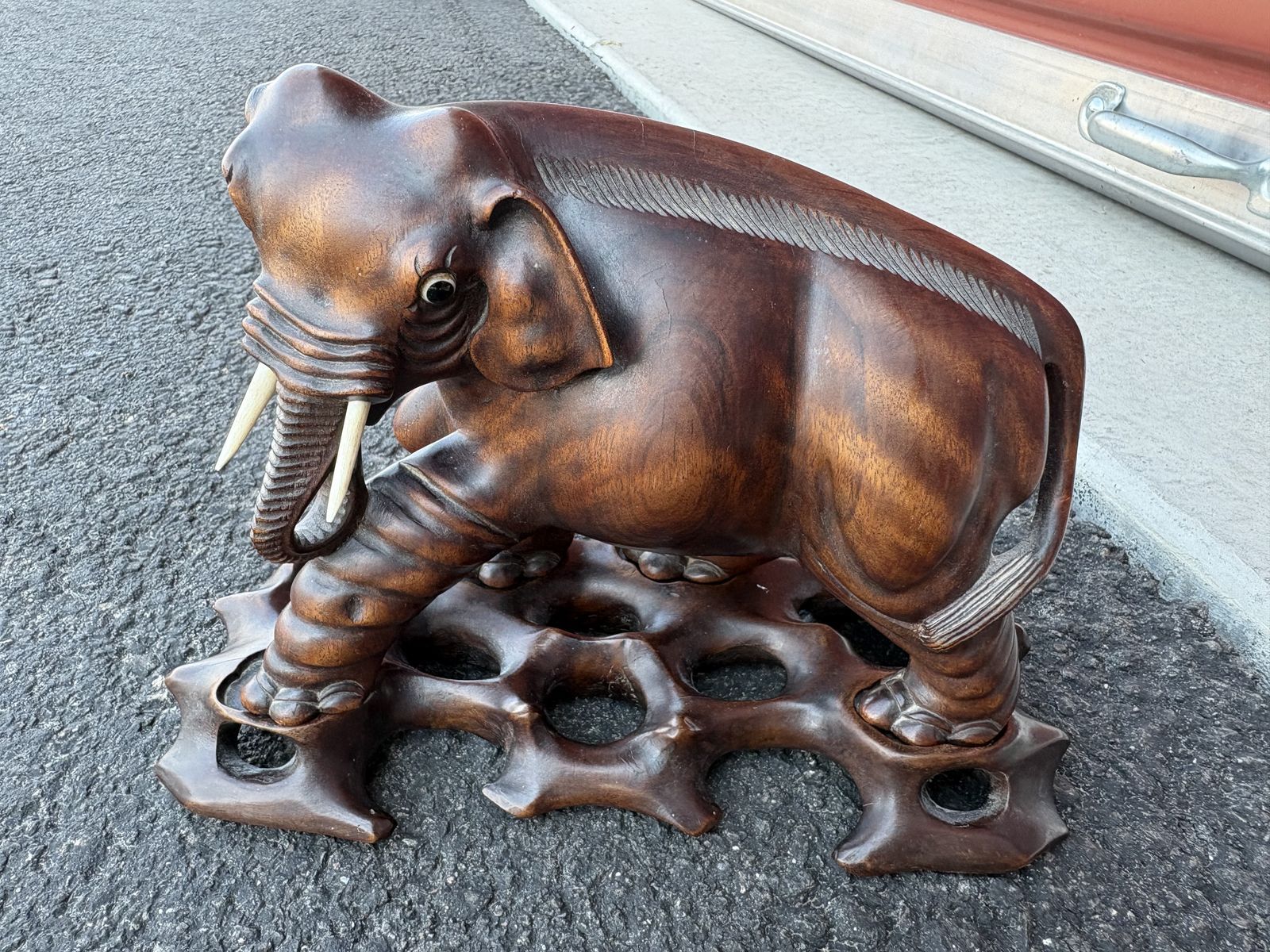 Stunning vintage mid century hand carved wooden elephant w/ carved base