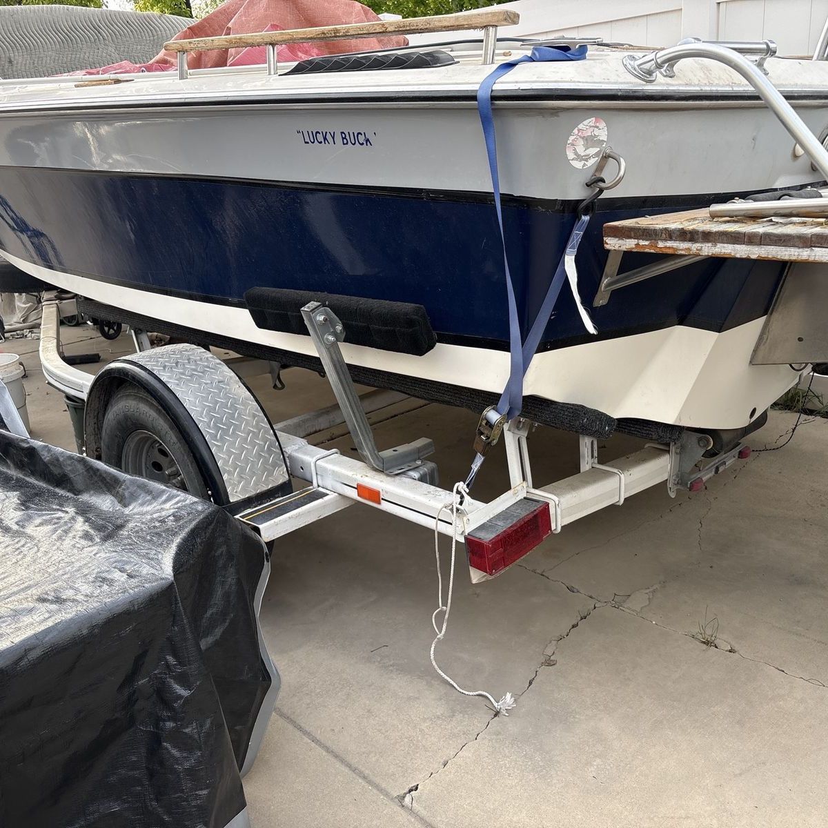 Fishing/skiing boat.