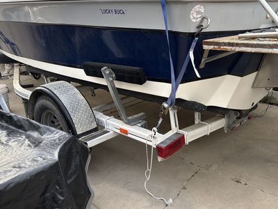 Fishing/skiing boat.