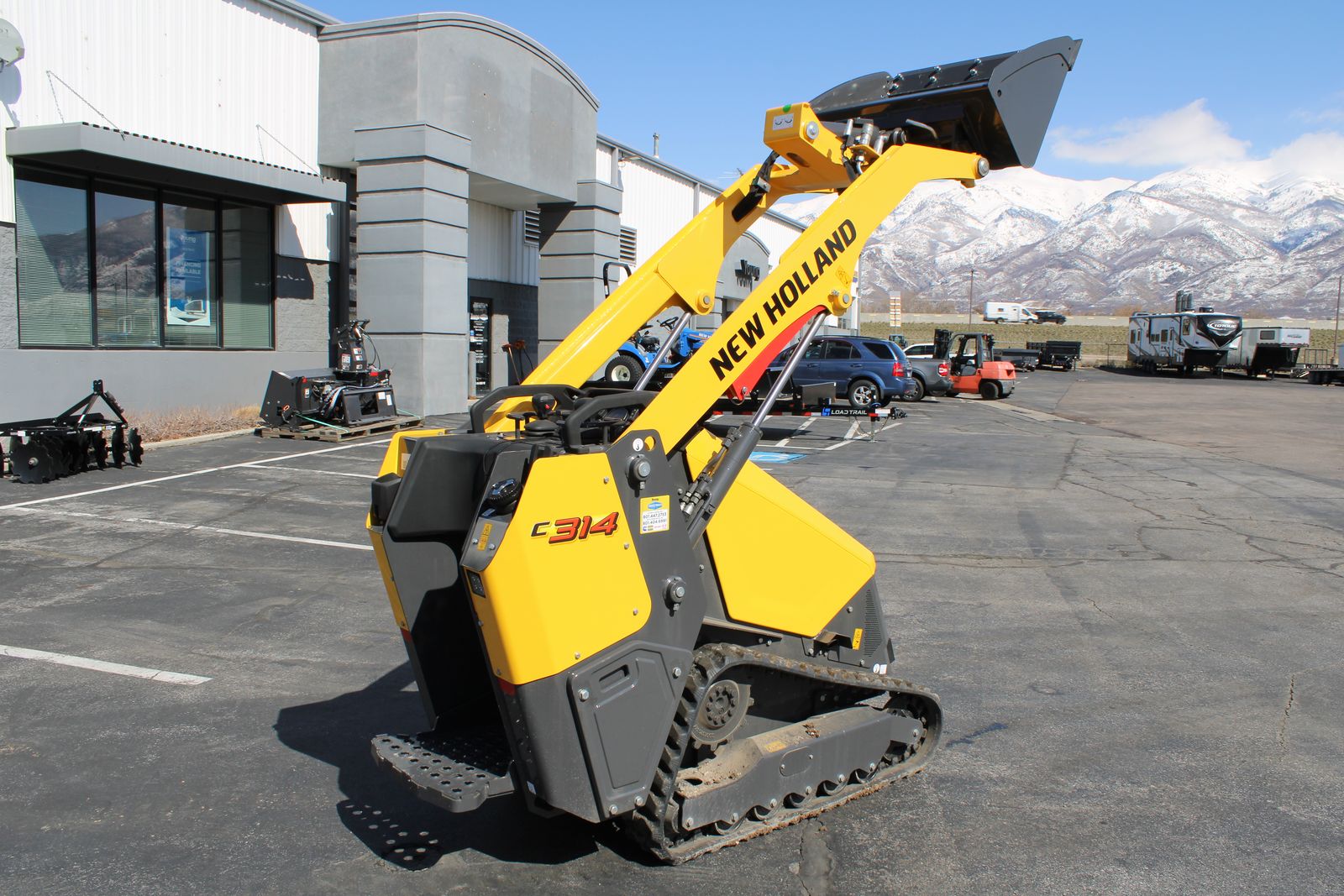 Rent the New Holland C314 Mini Track Loader – Just $99/Day!