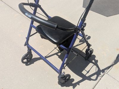 Blue Medical Rollator Walker with Seat and Storage Bag, Folding Design