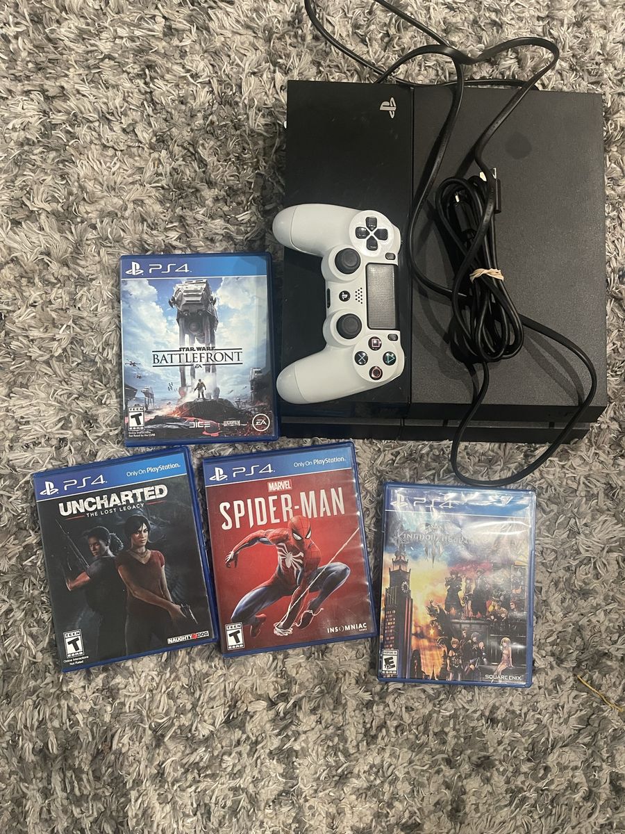 Sony PlayStation 4 (PS4) Console, White Controller, 4 Games - Used Good Condition
