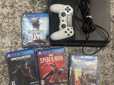 Sony PlayStation 4 (PS4) Console, White Controller, 4 Games - Used Good Condition