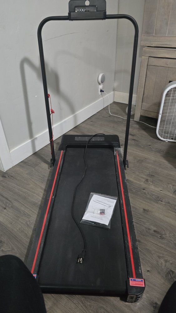 Compact Electric Treadmill with Console Display - Black/Red Trim, Folding Design for Small Spaces