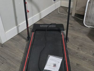Compact Electric Treadmill with Console Display - Black/Red Trim, Folding Design for Small Spaces