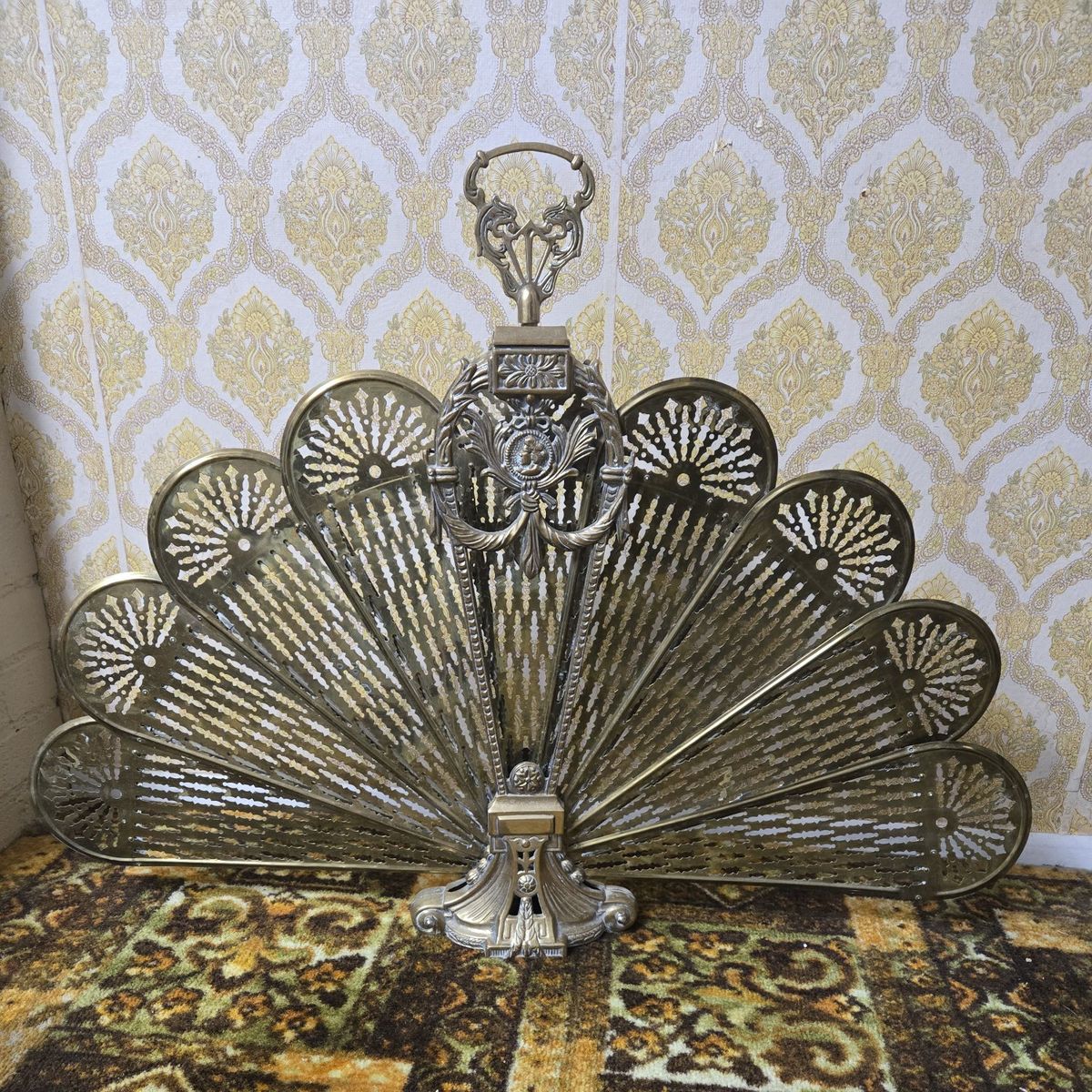 Vintage Victorian-style brass peacock fan