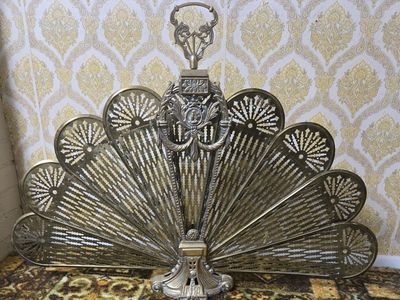 Vintage Victorian-style brass peacock fan