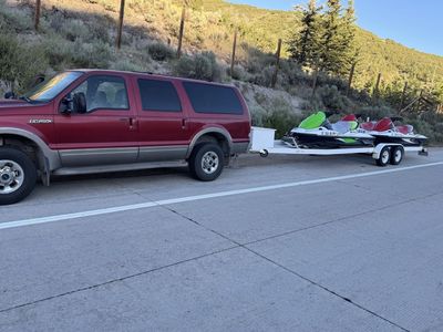 3 kawasaki stx 15f jet skis and four place trailer