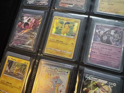 Assorted Pokemon Trading Cards Lot in Binder - Pikachu, Gengar, Charizard & More