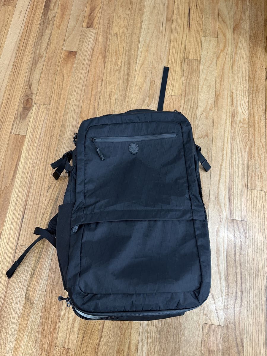 Tortuga 34L Black Travel Backpack Carry-On Luggage with Multiple Compartments