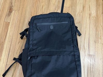Tortuga 34L Black Travel Backpack Carry-On Luggage with Multiple Compartments