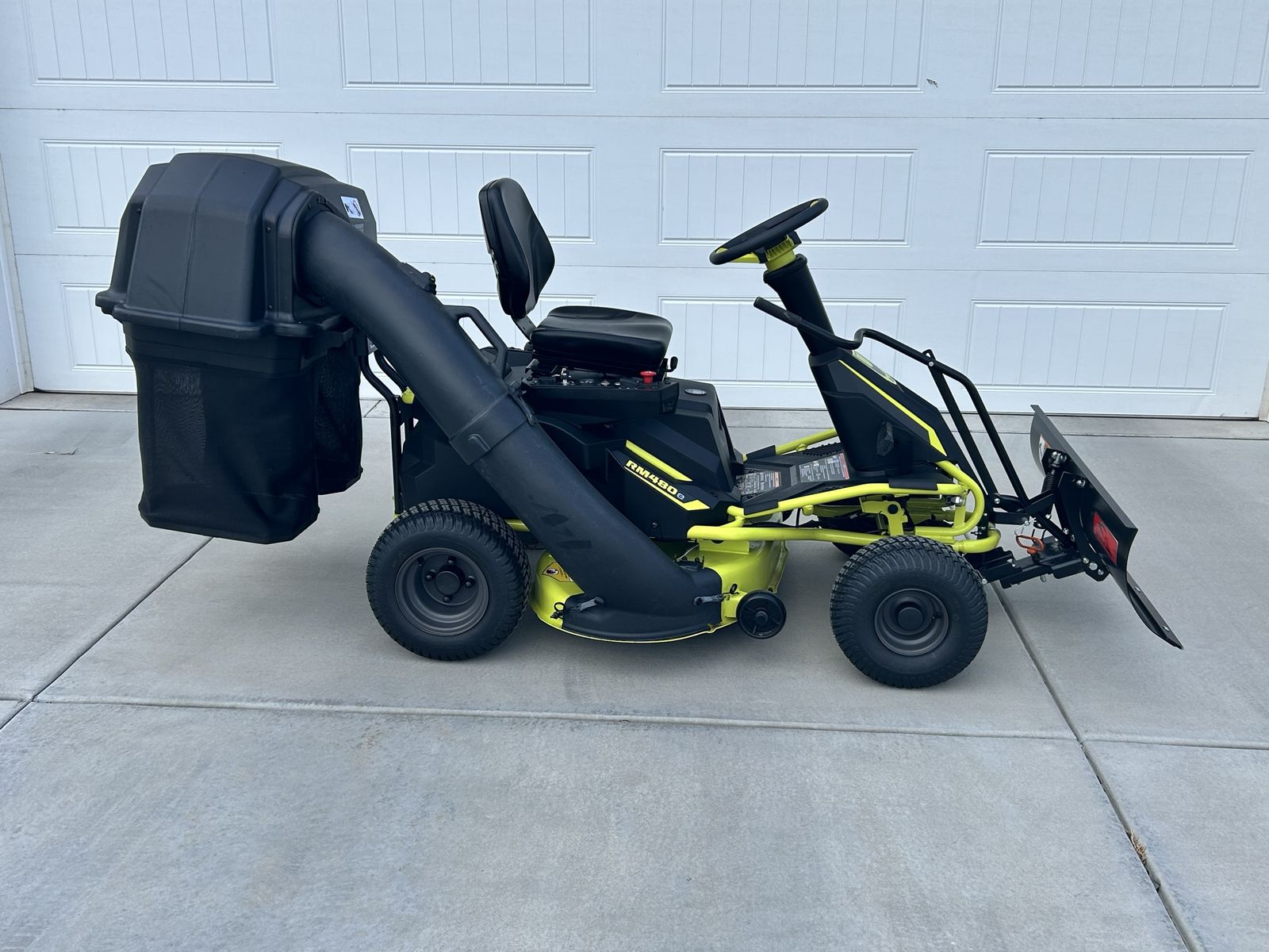 RYOBI Electric Riding Lawn Mower with Bagger and Snow Plow Attachment