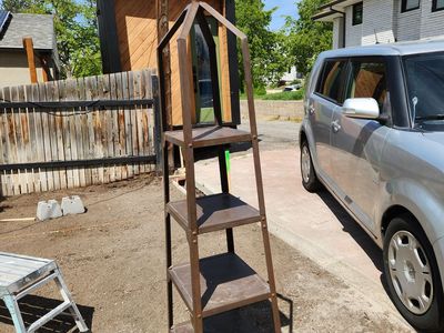 Metal plant stand. 5 shelves. Very heavy duty. Perfect shape.