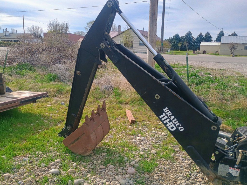 selling a bradco backhoe attachment for a tractor