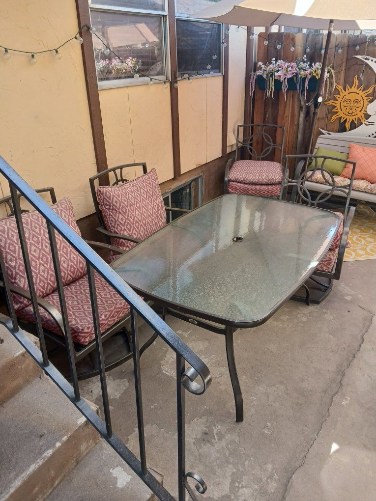 Patio Dining Set - Glass Top Table & 4 Swivel Chairs with Cushions - Outdoor Furniture