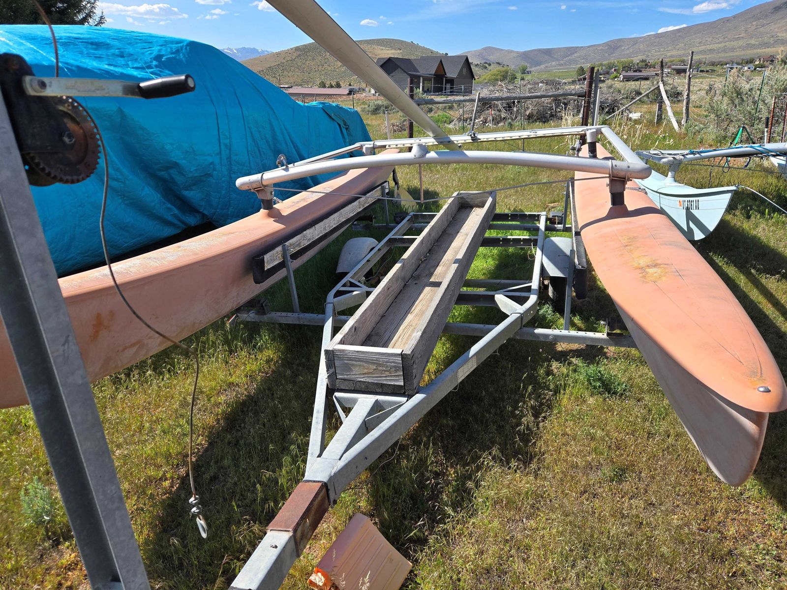 Two Hobie 16 1980's and one Hobie Aqua Cat 12 Catamarans