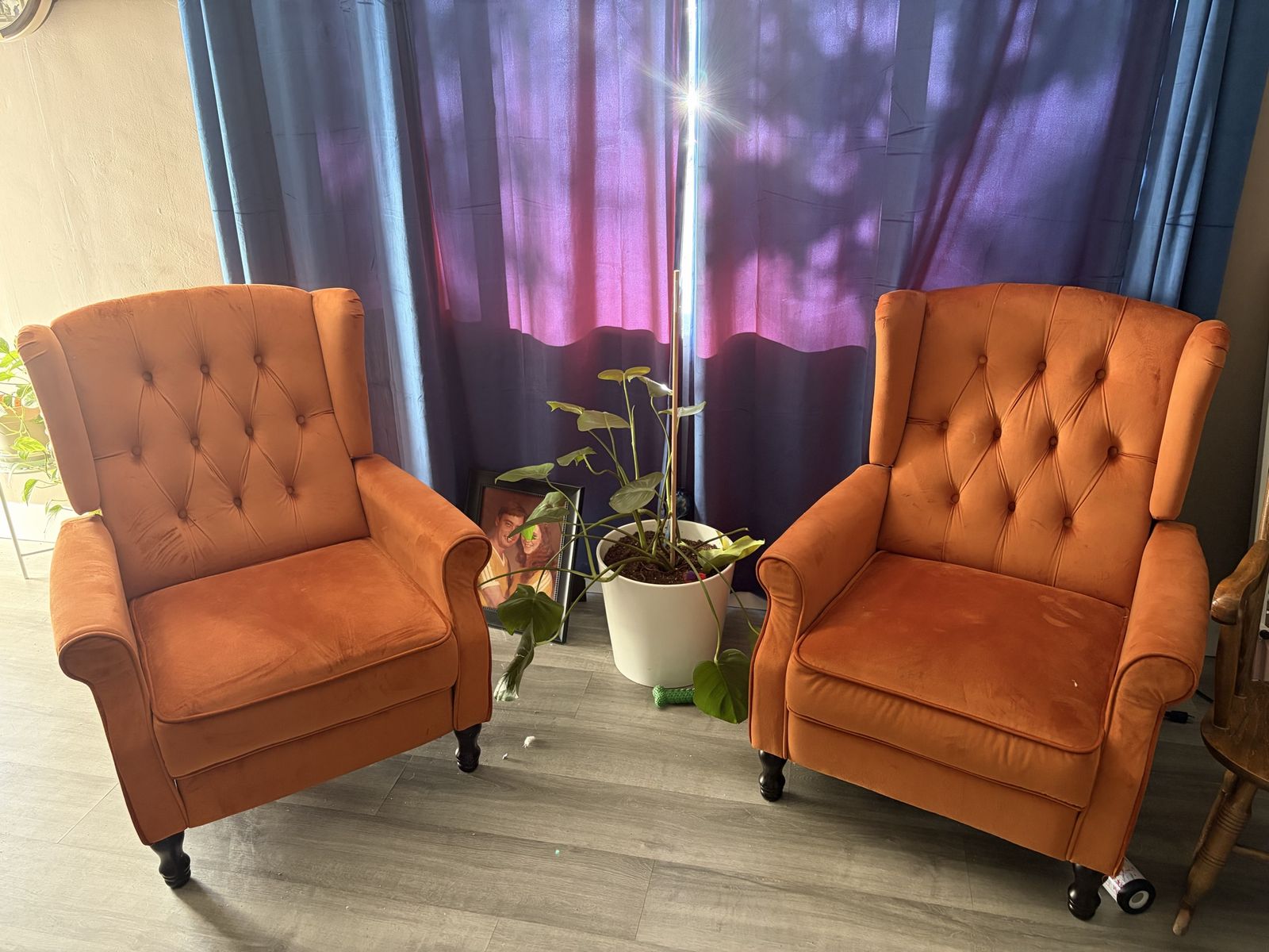 Orange velvet matching recliners