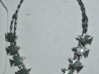vintage Navajo Squash blossom necklace $800
vintage Navajo Squash blossom necklace featuring peyote bird mofits turquoise $1000
