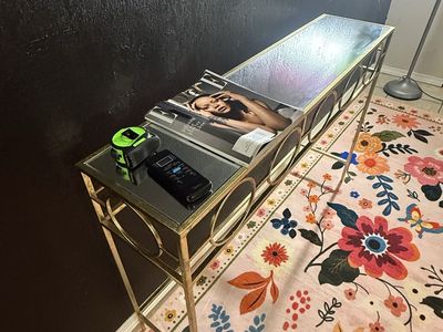 Gold Metal and Glass Console Table with Geometric Ring Design