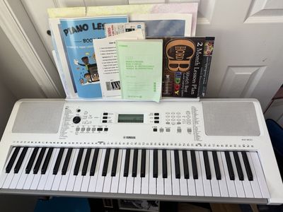 Yamaha EZ-300 Portable Electronic Keyboard Piano w/ Lighted Keys & Stand with bench