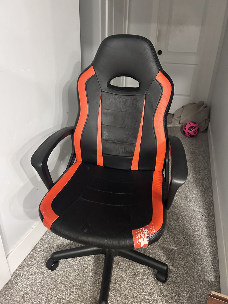 gaming chair, i also have a black office chair in much better condition if interested